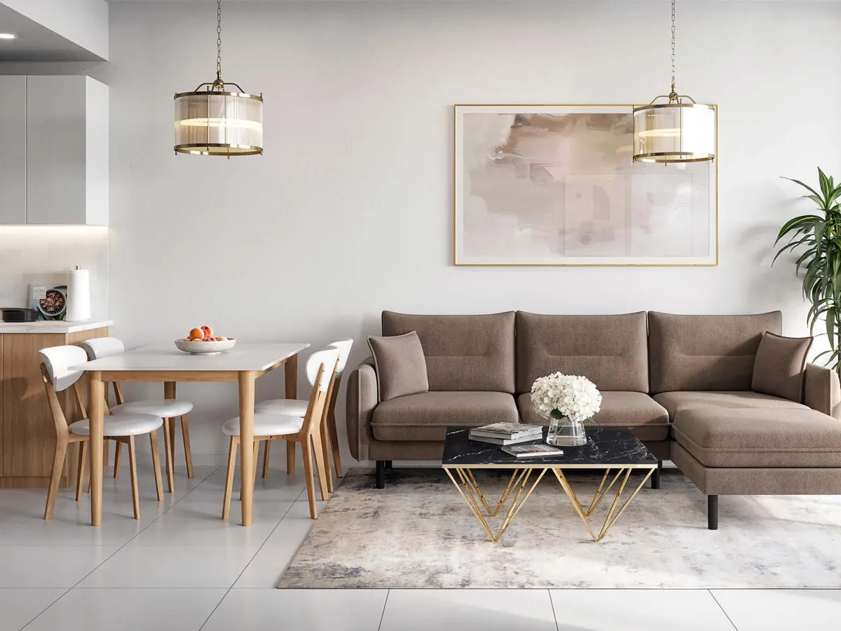 Show apartment living room with sofa, dining table and open kitchen